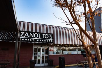 A striped awning hangs over the entrance to Zanotto's Family Markets.